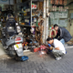 Illustration for article titled The Most Dedicated Mechanics In The World Wrench On The Streets Of Hong Kong